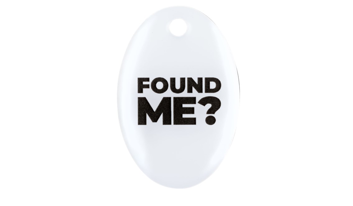 White medium oval plastic Tag